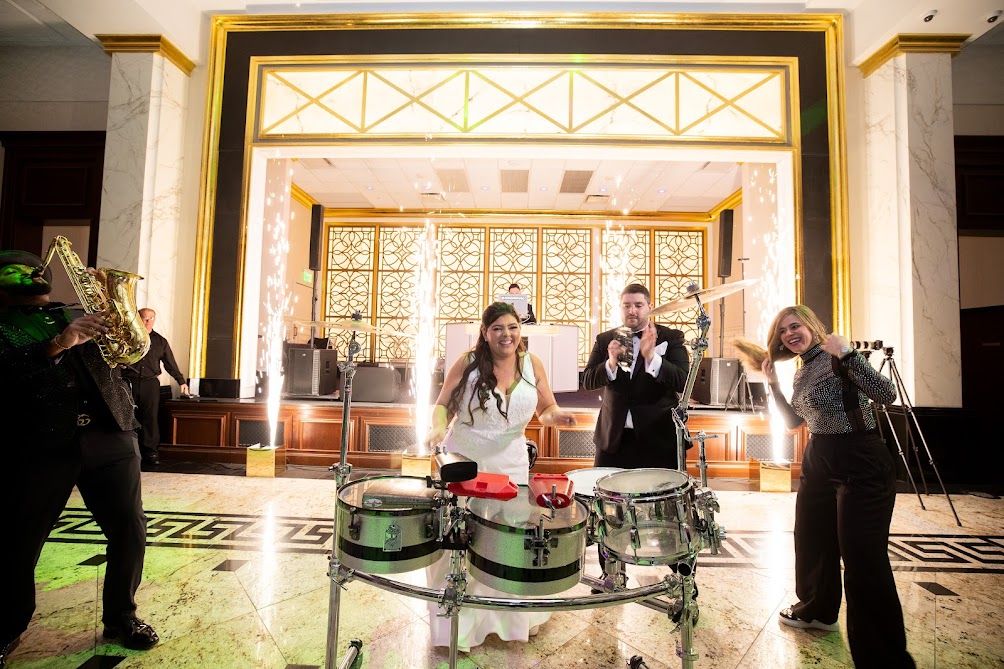 Live band playing at a Denver ballroom wedding reception
